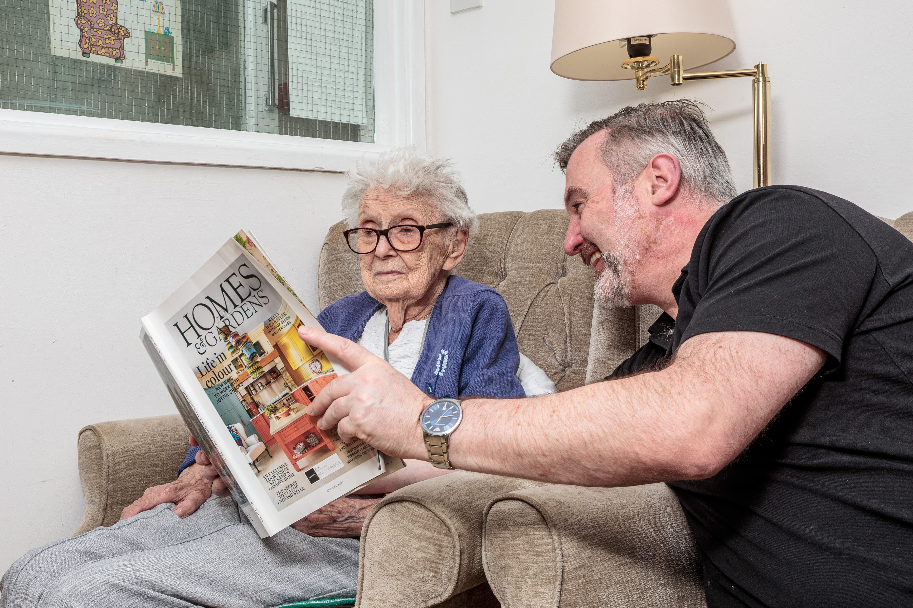 Staff member helping a resident